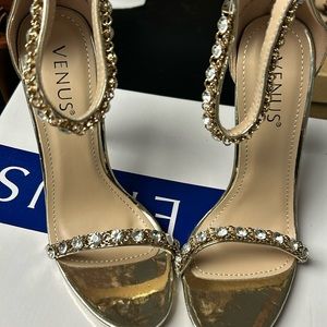 Venus  gold rhinestone heels.